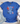 Blue t-shirt with patriotic design on a wooden surface with shorts and sneakers.