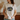 Person wearing a t-shirt with a humorous graphic design and holding a mug.
