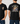 Black t-shirt with fish graphic and text on front and back worn by a person.