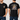 Black t-shirt with fish graphic and text on front and back worn by a person.