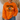 A person wearing a bright orange crewneck sweatshirt with a black and brown football graphic and text on the front, paired with blue jeans in a home setting.