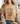 Person wearing a beige t-shirt with a floral and pumpkin design and text.