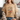 Person wearing a beige t-shirt with a floral and pumpkin design and text.