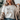 white t-shirt with 'but God' printed on it