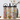 Three colorful water bottles with floral and abstract designs on a wooden surface.