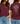 A split-view model photo showing a heathered burgundy short-sleeve T-shirt worn by a woman. The left view shows the front with the words 'BOLD FAITH' in white near the chest.