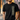 Person wearing a black t-shirt with 'CHosen 1 Peter 2:9' text design.
