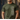 Person wearing a green t-shirt with camouflage text design against a wooden background