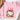 A folded light pink crewneck sweatshirt with a festive Christmas graphic of a white goose wearing a red bow, surrounded by red candles, pink flowers, and holiday ornaments. The sweatshirt is styled on a white marble background with a brown hat and dried flowers.