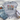 A light gray graphic t-shirt laid flat on a white wooden surface, styled with light blue jeans and white sneakers. The t-shirt features a colorful, patterned 'FAITH' text with small hearts, above the words 'OVER FEAR' in black script and print.
