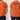 Orange t-shirt with 'Fishers of Men' design on a white brick wall background