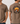 Brown t-shirt with fishing-themed design on front and back, featuring text and graphics.