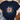 Navy blue t-shirt with a colorful flower design and text on a textured surface.