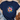 Navy blue t-shirt with a colorful flower graphic and text on a textured surface.