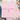 A light pink crewneck sweatshirt laid flat on a white wood surface, with the phrase 'the house that built me' and a small church icon printed in darker pink on the front. Jeans, a cup of coffee, and a plaid blanket are partially visible around it as styling props.