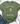 An olive green graphic t-shirt featuring a cartoon frog riding a bicycle with flowers, styled in a flat lay with blue jeans, white sneakers, and a small plant on a white wood background.