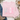A light pink crewneck sweatshirt laid flat on a white wood surface, featuring a large 'MADE for more' graphic with floral, striped, and gingham lettering, plus 'EPHESIANS 2:10' in script below. Surrounding props include blue jeans, a beige shoe, a cup of coffee, and greenery.