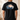 Black t-shirt with a graphic of a man and his dog  in a boat on the back, set against a plain background.