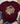 A maroon short-sleeve graphic T-shirt laid flat on a white wood surface, styled with blue jeans, beige loafers, a straw hat, and greenery. The shirt has a large front graphic reading “Mountain Mover” with a mountain illustration and “Matthew 18:20-21” text.