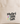 A split view showing the front and back of a natural canvas tote bag with brown shoulder straps. The front has a pocket with the words 'Mustard seed Faith' in black and small colorful flowers.