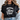 Person wearing a black t-shirt with 'Praying Moms Club' text.