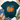 A dark teal t-shirt with a colorful autumn pumpkin graphic, styled in a flat lay with blue jeans, beige loafers, a straw hat, and eucalyptus on a white wood background.