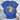 Blue t-shirt with patriotic design on a wooden surface with shorts and sneakers.