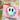 Pink towel with smiley face design held by a person in a sunroom.
