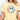 Person wearing a yellow t-shirt with a smiley face design featuring flowers on a plain background