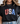 Person wearing a black t-shirt with 'USA' design