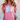 Person wearing a pink t-shirt with colorful text design